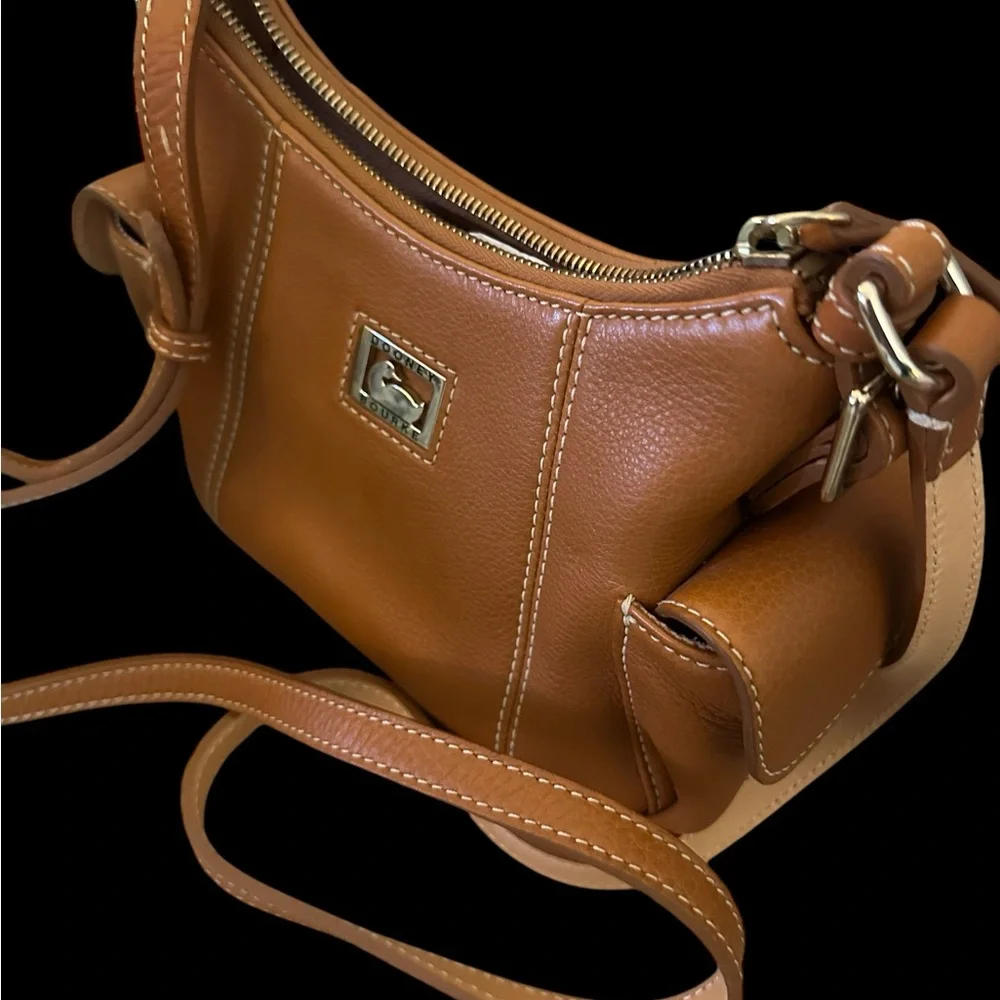Dooney & Bourke Pebbled Grain Pocket Sac Crossbody with Side Pockets.